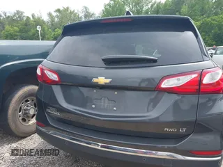 2019 Chevrolet Equinox LT z VIN 2GNAXTEV6K6190023, wystawiony jako IAAI lot #42277035 z przebiegiem 121 218 mil mil oraz . Historia ofert i sprzedaży dostępna na DreamBid. Obrazek 16.