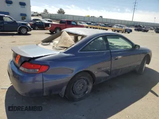 2000 Toyota Solara SE z VIN 2T1CF28P0YC350027, wystawiony jako Copart lot #52181555 z przebiegiem 220 178 mil mil oraz Szkoda całkowita • Salvage title. Historia ofert i sprzedaży dostępna na DreamBid. Obrazek 3.