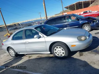 1999 Mercury Sable GS with VIN 1MEFM50U1XA612306, listed as a IAAI auction lot 41745776 with 111,311 mi miles. Bid and sale history available at carsss.com. Image 13.