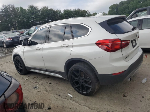 2019 BMW X1 xDrive28i with VIN WBXHT3C52K3H34021, listed as a Copart auction lot 64032535 with 30,752 mi miles and Salvage title. Bid and sale history available at DreamBid. Image 2.