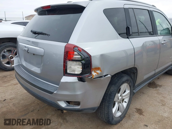 2016 Jeep Compass Sport with VIN 1C4NJDBB8GD780146, listed as a IAAI auction lot 41792416 with 127,548 mi miles. Bid and sale history available at carsss.com. Image 6.