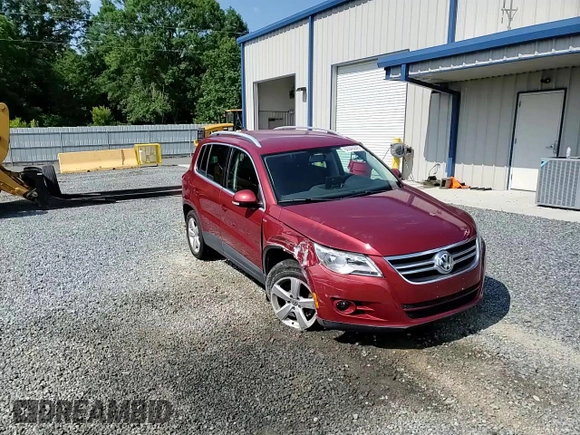 2010 Volkswagen Tiguan Wolfsburg Edition with VIN WVGAV7AX4AW003410, listed as a Copart auction lot 60645845 with 128,563 mi miles and Salvage title. Bid and sale history available at DreamBid. Image 14.