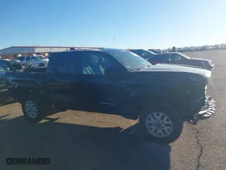 2024 Toyota Tacoma 2WD SR5 with VIN 3TMKB5FN0RM011416, listed as a IAAI auction lot 41303796 with 9,923 mi miles. Bid and sale history available at carsss.com. Image 14.