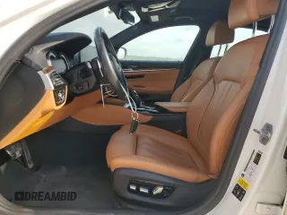 2018 BMW 5 Series M550i xDrive with VIN WBAJB9C58JG464461, listed as a Copart auction lot 53626575 with 62,436 mi miles and Salvage Title. Bid and sale history available at carsss.com. Image 7.
