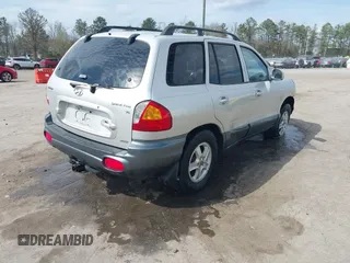 2002 Hyundai Santa Fe GLS with VIN KM8SC73D62U209998, listed as a IAAI auction lot 41915060 with 228,451 mi miles. Bid and sale history available at carsss.com. Image 4.