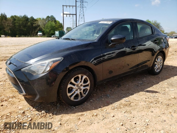 2018 Toyota Yaris with VIN 3MYDLBYV0JY326720, listed as a Copart auction lot 52027505 with 105,127 mi miles and Salvage Title. Bid and sale history available at DreamBid. Image 1.