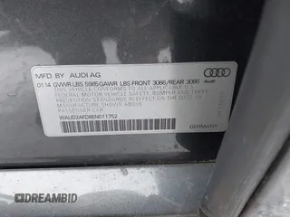 2014 Audi S8 with VIN WAUD2AFD8EN011752, listed as a IAAI auction lot 41556173 with 115,648 mi miles. Bid and sale history available at carsss.com. Image 9.