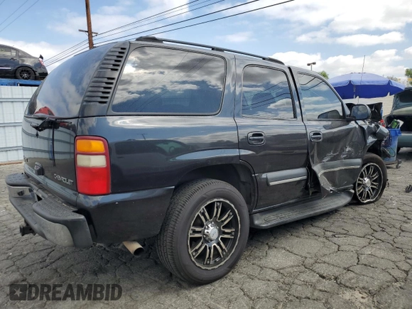 2003 Chevrolet Tahoe LT with VIN 1GNEC13TX3R293907, listed as a Copart auction lot 71849144 with 238,669 mi miles and Salvage Title. Bid and sale history available at carsss.com. Image 3.