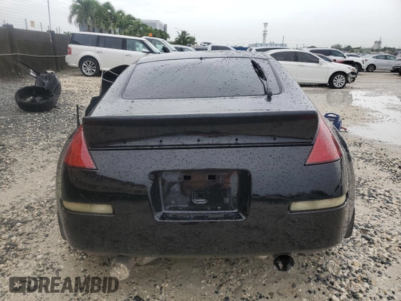 2004 Nissan 350Z Touring with VIN JN1AZ34D04T160475, listed as a Copart auction lot 59435035 with 122,875 mi miles and Salvage title. Bid and sale history available at DreamBid. Image 6.
