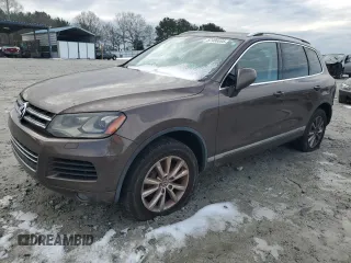 2013 Volkswagen Touareg Lux with VIN WVGEF9BP1DD006810, listed as a Copart auction lot 87906695 with 172,473 mi miles and Clean Title. Bid and sale history available at DreamBid. Image 1.