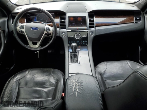 2013 Ford Taurus Limited z VIN 1FAHP2F89DG174546, wystawiony jako Copart lot #61003745 z przebiegiem 140 919 mil mil oraz Czysty tytuł • Clean title. Historia ofert i sprzedaży dostępna na DreamBid. Obrazek 8.