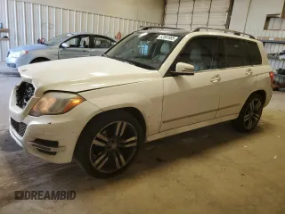 2015 Mercedes-Benz GLK with VIN WDCGG5HB1FG415402, listed as a Copart auction lot 52597865 with 261,299 mi miles and Salvage Title. Bid and sale history available at carsss.com. Image 1.