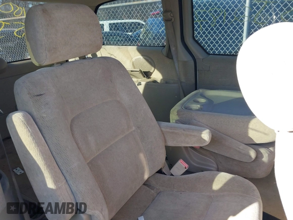 2005 Kia Sedona LX with VIN KNDUP132756764528, listed as a IAAI auction lot 41709414 with 999,999 mi miles. Bid and sale history available at carsss.com. Image 8.