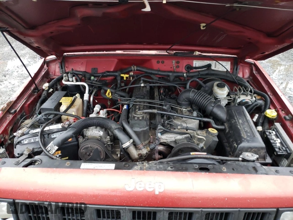1999 Jeep Cherokee SE with VIN 1J4FF28S9XL645291, listed as a Copart auction lot 87064124 with Not provided miles and Salvage title. Bid and sale history available at DreamBid. Image 12.