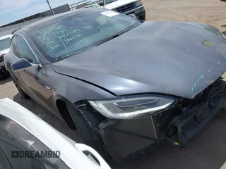 2018 Tesla Model S 75D with VIN 5YJSA1E43JF260547, listed as a IAAI auction lot 42346240 with 89,637 mi miles and . Bid and sale history available at DreamBid. Image 1.