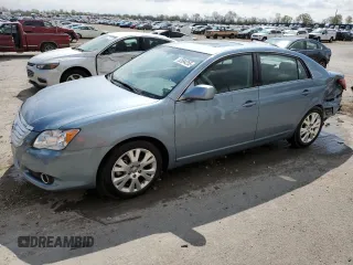 2010 Toyota Avalon XL with VIN 4T1BK3DB3AU357047, listed as a Copart auction lot 52694255 with 130,749 mi miles and Salvage Title. Bid and sale history available at carsss.com. Image 1.