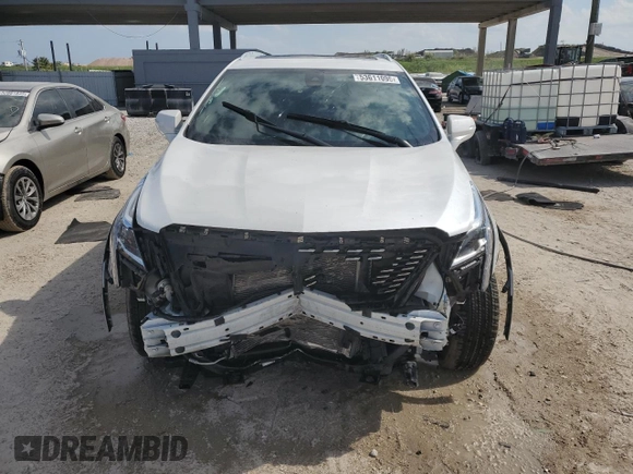 2021 Cadillac XT5 FWD Premium Luxury z VIN 1GYKNCRS7MZ115531, wystawiony jako Copart lot #53611095 z przebiegiem 34 931 mil mil oraz Szkoda całkowita • Salvage title. Historia ofert i sprzedaży dostępna na DreamBid. Obrazek 5.