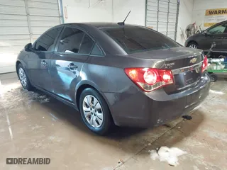 2014 Chevrolet Cruze LS with VIN 1G1PB5SH5E7460979, listed as a IAAI auction lot 41312075 with 123,580 mi miles. Bid and sale history available at carsss.com. Image 3.