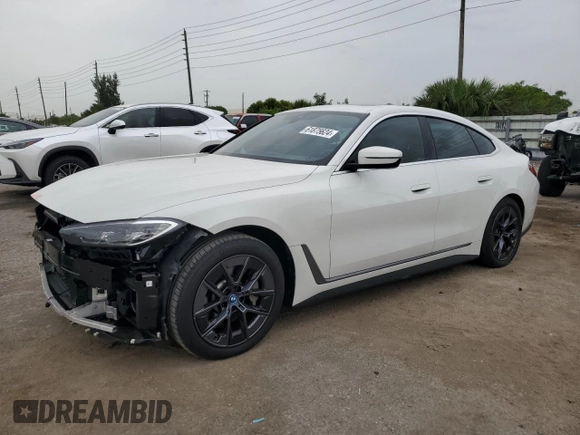 2023 BMW i4 eDrive40 with VIN WBY73AW0XPFN60228, listed as a Copart auction lot 61875624 with 21,597 mi miles and Salvage Title. Bid and sale history available at carsss.com. Image 1.