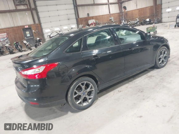 2014 Ford Focus SE with VIN 1FADP3F20EL114485, listed as a IAAI auction lot 41988373 with 119,963 mi miles. Bid and sale history available at carsss.com. Image 4.