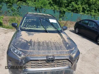 2021 Toyota RAV4 XLE with VIN 2T3P1RFV1MC214257, listed as a IAAI auction lot 42297014 with Not provided miles and . Bid and sale history available at DreamBid. Image 12.