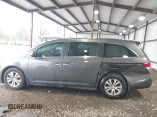 2014 Honda Odyssey EX-L with VIN 5FNRL5H6XEB060090, listed as a IAAI auction lot 41625571 with 112,762 mi miles and . Bid and sale history available at carsss.com. Image 14.