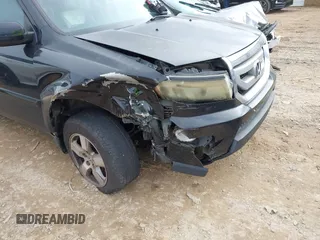 2011 Honda Pilot EX-L with VIN 5FNYF3H69BB043509, listed as a IAAI auction lot 41127719 with 241,167 mi miles and . Bid and sale history available at DreamBid. Image 6.