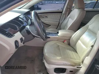 2012 Ford Taurus Limited z VIN 1FAHP2FW6CG136463, wystawiony jako Copart lot #57159005 z przebiegiem 124 833 mil mil oraz Szkoda całkowita • Salvage title. Historia ofert i sprzedaży dostępna na DreamBid. Obrazek 7.
