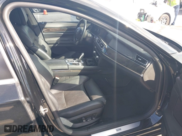 2012 BMW 7 Series 740i with VIN WBAKA4C5XCDS99253, listed as a IAAI auction lot 41710171 with 176,907 mi miles. Bid and sale history available at carsss.com. Image 5.