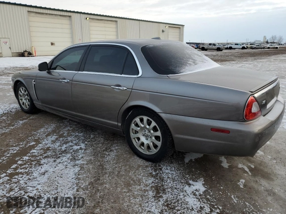 2009 Jaguar XJ with VIN SAJXA82B69SH31532, listed as a Copart auction lot 88027035 with 90,233 mi miles and Clean Title. Bid and sale history available at DreamBid. Image 2.