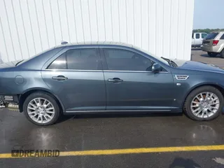 2009 Cadillac STS AWD w/1SB with VIN 1G6DD67V090151883, listed as a IAAI auction lot 42075438 with 97,408 mi miles. Bid and sale history available at carsss.com. Image 14.