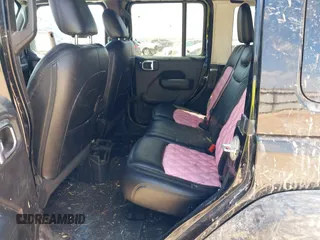 2022 Jeep Wrangler Unlimited Sport with VIN 1C4HJXDG7NW120432, listed as a IAAI auction lot 40498948 with 11,235 mi miles and . Bid and sale history available at DreamBid. Image 8.