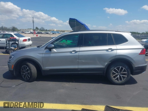 2021 Volkswagen Tiguan S with VIN 3VV1B7AX7MM117954, listed as a IAAI auction lot 42300223 with 45,587 mi miles and . Bid and sale history available at DreamBid. Image 14.