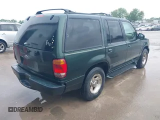 1998 Ford Explorer XLT z VIN 1FMZU35P1WZA75454, wystawiony jako IAAI lot #42360349 z przebiegiem 169 560 mil mil oraz . Historia ofert i sprzedaży dostępna na DreamBid. Obrazek 4.