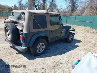 1997 Jeep Wrangler Sport with VIN 1J4FY19S1VP426589, listed as a IAAI auction lot 41865628 with 171,770 mi miles. Bid and sale history available at carsss.com. Image 4.