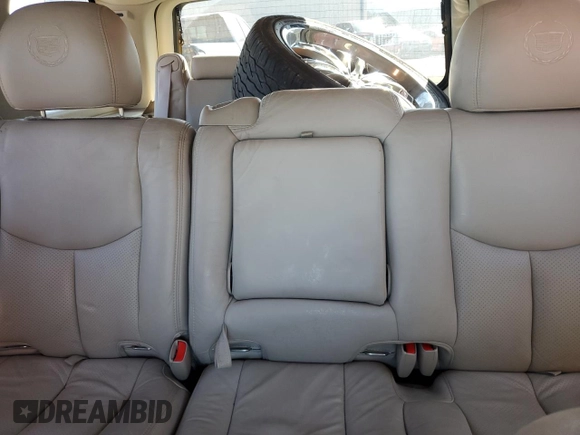 2003 Cadillac Escalade z VIN 1GYEC63T83R157632, wystawiony jako Copart lot #54950564 z przebiegiem 88 527 mil mil oraz Szkoda całkowita • Salvage title. Historia ofert i sprzedaży dostępna na DreamBid. Obrazek 10.