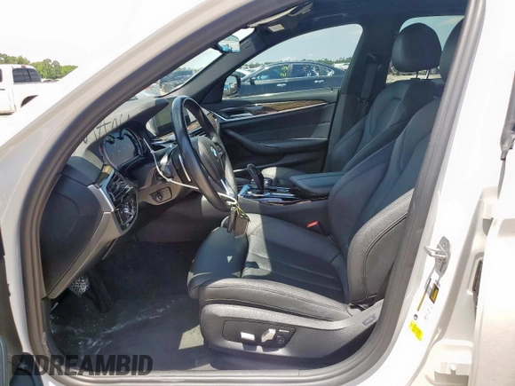 2018 BMW 5 Series 530i with VIN WBAJA5C55JG899661, listed as a Copart auction lot 58302215 with 62,112 mi miles and Salvage title. Bid and sale history available at DreamBid. Image 7.