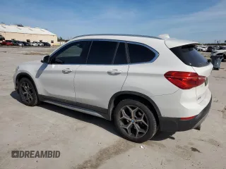 2019 BMW X1 sDrive28i with VIN WBXHU7C52K3H44195, listed as a Copart auction lot 42304175 with 88,929 mi miles and Salvage Title. Bid and sale history available at carsss.com. Image 2.