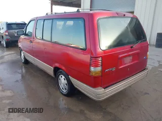 1996 Ford Aerostar with VIN 1FMDA31X1TZC09092, listed as a IAAI auction lot 41784476 with 173,065 mi miles. Bid and sale history available at carsss.com. Image 3.