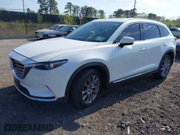 2018 Mazda CX-9 Signature with VIN JM3TCBEY5J0232858, listed as a IAAI auction lot 42131815 with 86,278 mi miles and . Bid and sale history available at carsss.com. Image 2.