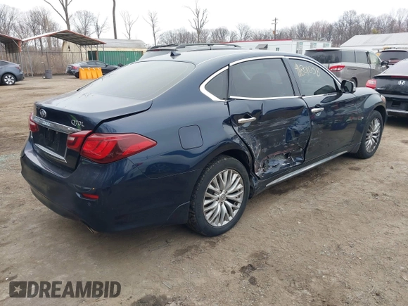 2015 Infiniti Q70 with VIN JN1BY1PRXFM832185, listed as a IAAI auction lot 41801058 with 101,503 mi miles and . Bid and sale history available at DreamBid. Image 4.