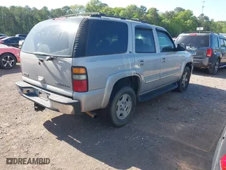 2004 Chevrolet Tahoe LT with VIN 1GNEC13Z24J249971, listed as a IAAI auction lot 42021072 with 367,657 mi miles. Bid and sale history available at carsss.com. Image 4.