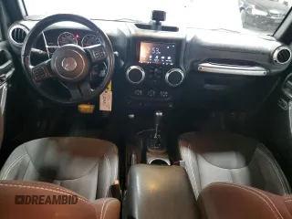 2015 Jeep Wrangler Unlimited Sahara with VIN 1C4BJWEG5FL743663, listed as a Copart auction lot 60205225 with 69,922 mi miles and Salvage title. Bid and sale history available at DreamBid. Image 8.