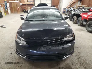 2015 Volkswagen Jetta SE with VIN 3VWD17AJ7FM213318, listed as a Copart auction lot 64006705 with 116,741 mi miles and Salvage title. Bid and sale history available at DreamBid. Image 5.