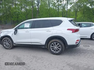 2019 Hyundai Santa Fe SE with VIN 5NMS2CAD9KH117777, listed as a IAAI auction lot 42296811 with 82,188 mi miles and . Bid and sale history available at DreamBid. Image 14.