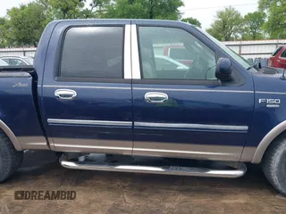2003 Ford F-150 XLT with VIN 1FTRW07L33KC83234, listed as a IAAI auction lot 41894573 with 215,232 mi miles. Bid and sale history available at carsss.com. Image 13.