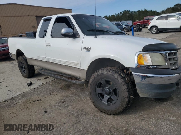 2001 Ford F-150 XL with VIN 1FTRX17L21NA52159, listed as a Copart auction lot 86756384 with Not provided miles and Salvage title. Bid and sale history available at DreamBid. Image 4.