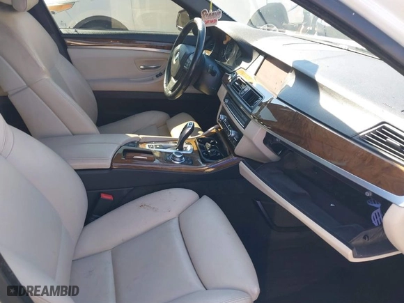 2012 BMW 5 Series 528i with VIN WBAXG5C54CDY28805, listed as a IAAI auction lot 41777043 with 128,056 mi miles. Bid and sale history available at carsss.com. Image 5.