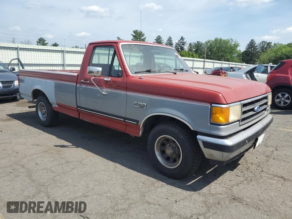 1990 Ford F-150 with VIN 1FTDF15NXLNA61972, listed as a Copart auction lot 60354815 with 21,243 mi miles and Clean title. Bid and sale history available at DreamBid. Image 4.