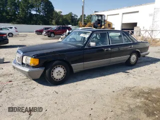 1987 Mercedes-Benz 560 with VIN WDBCA39D3HA355282, listed as a Copart auction lot 74798524 with 200,535 mi miles and Salvage Title. Bid and sale history available at DreamBid. Image 1.